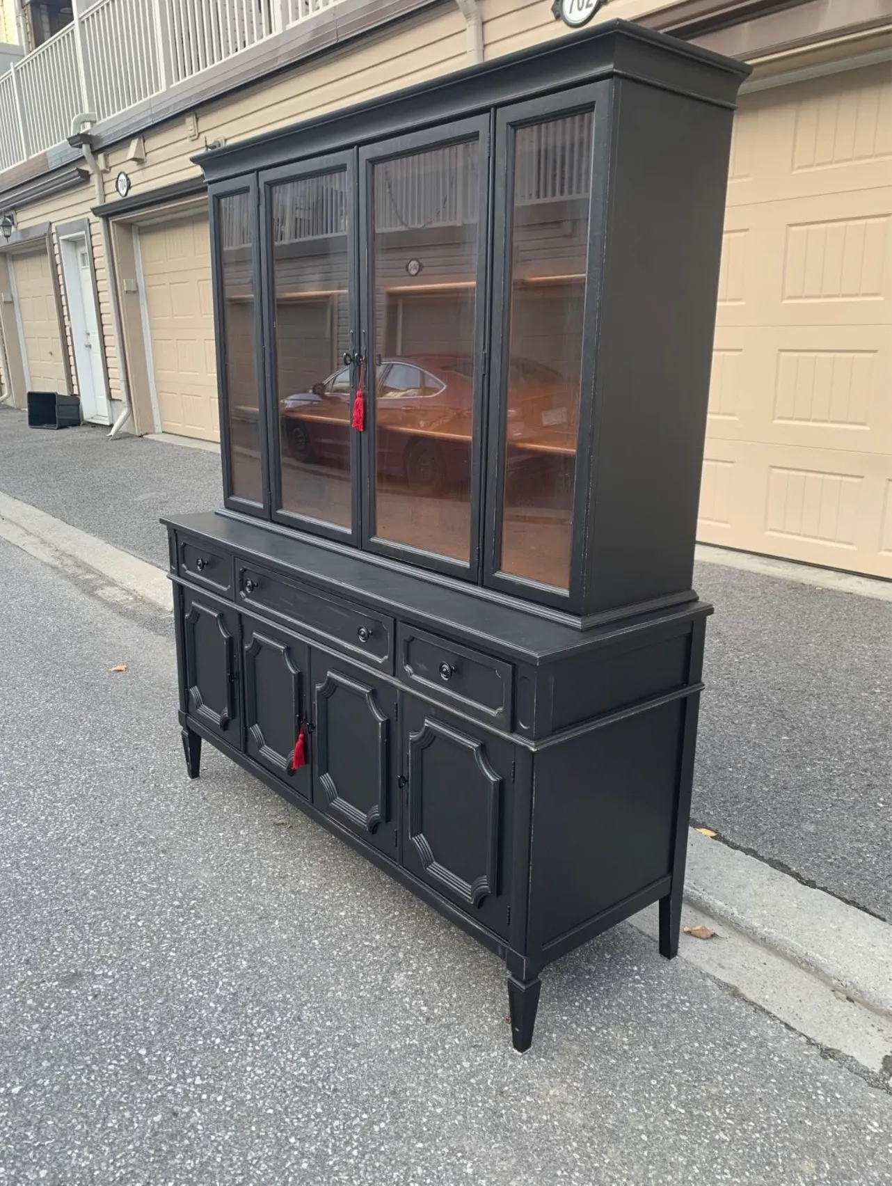 Large hand-painted black china cabinet and hutch, fully restored