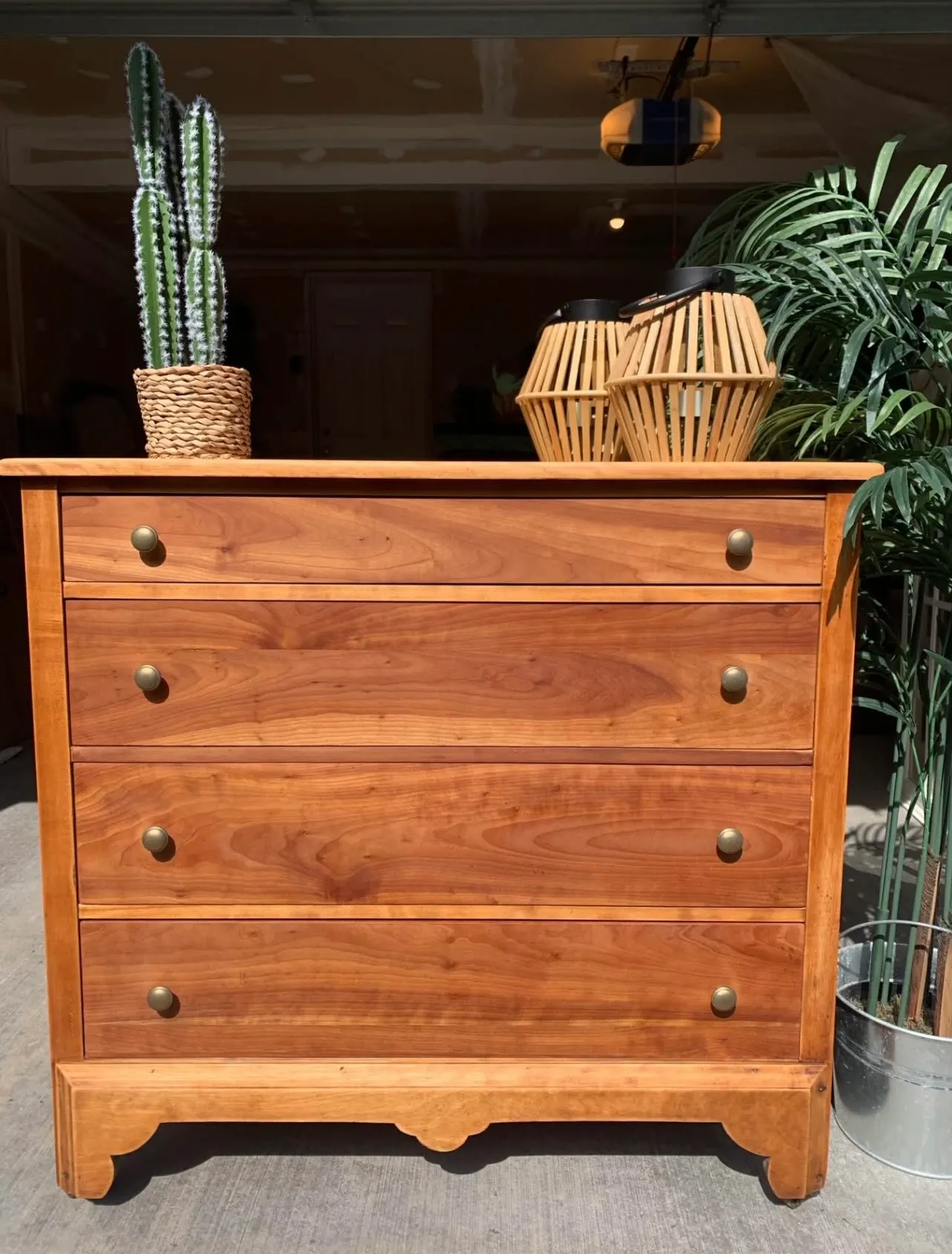 Detail of a restored and repainted wood cabinet piece